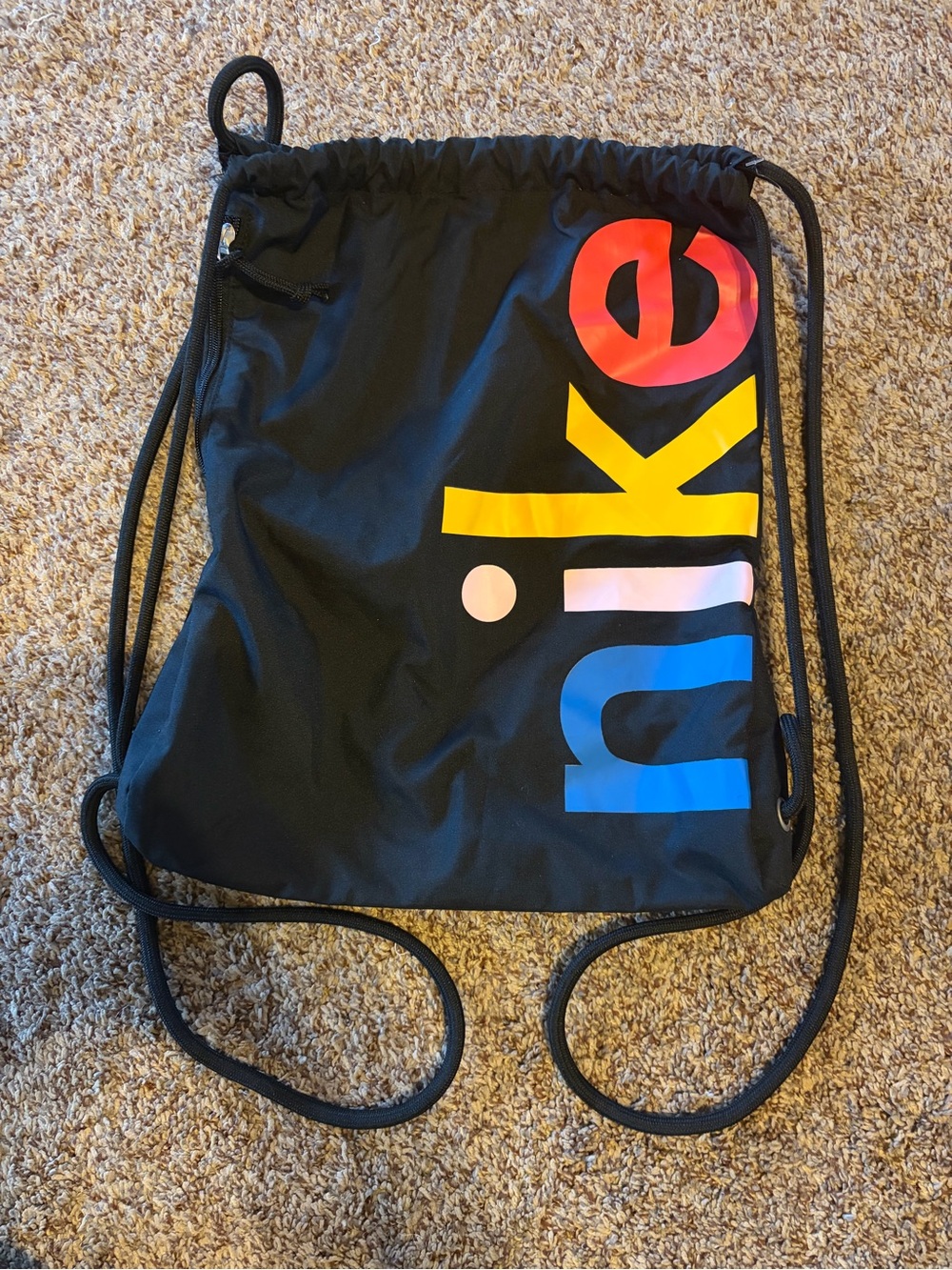 Nike Black Drawstring Backpack with Multicolor Logo
